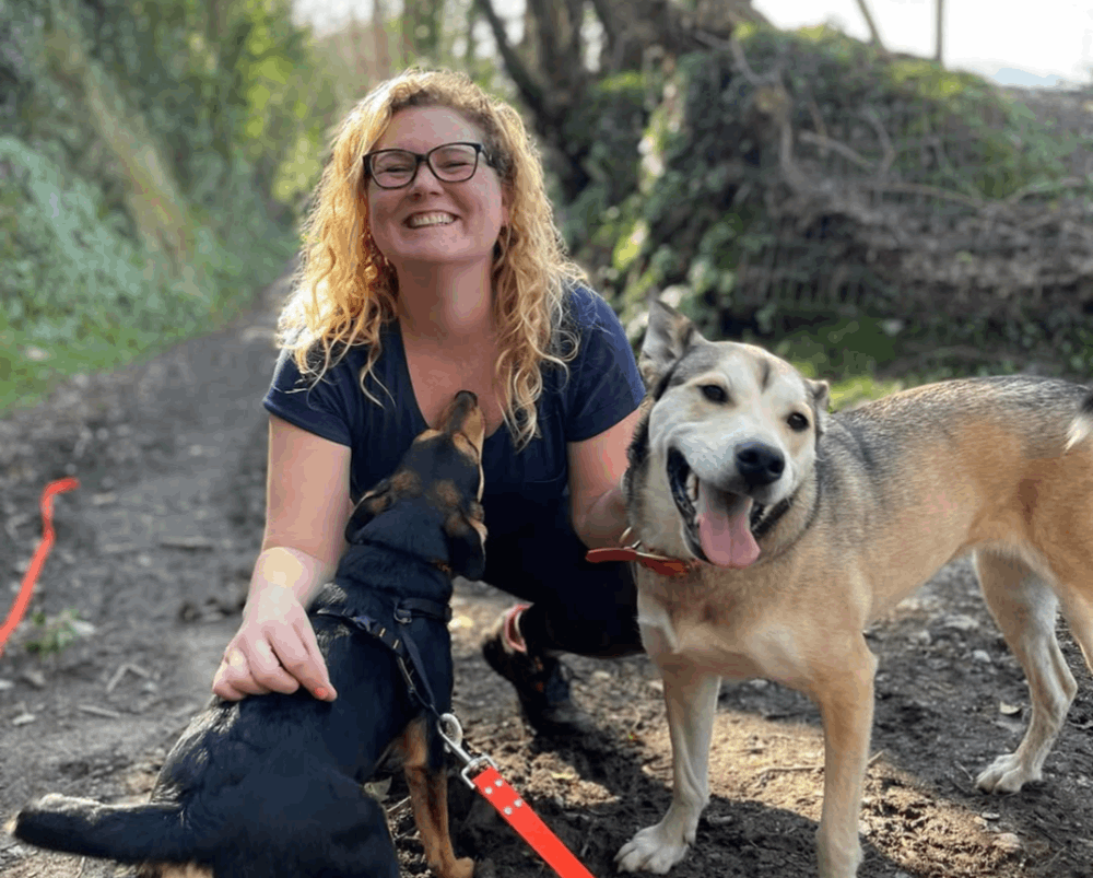 Rochelle on a trail with dogs